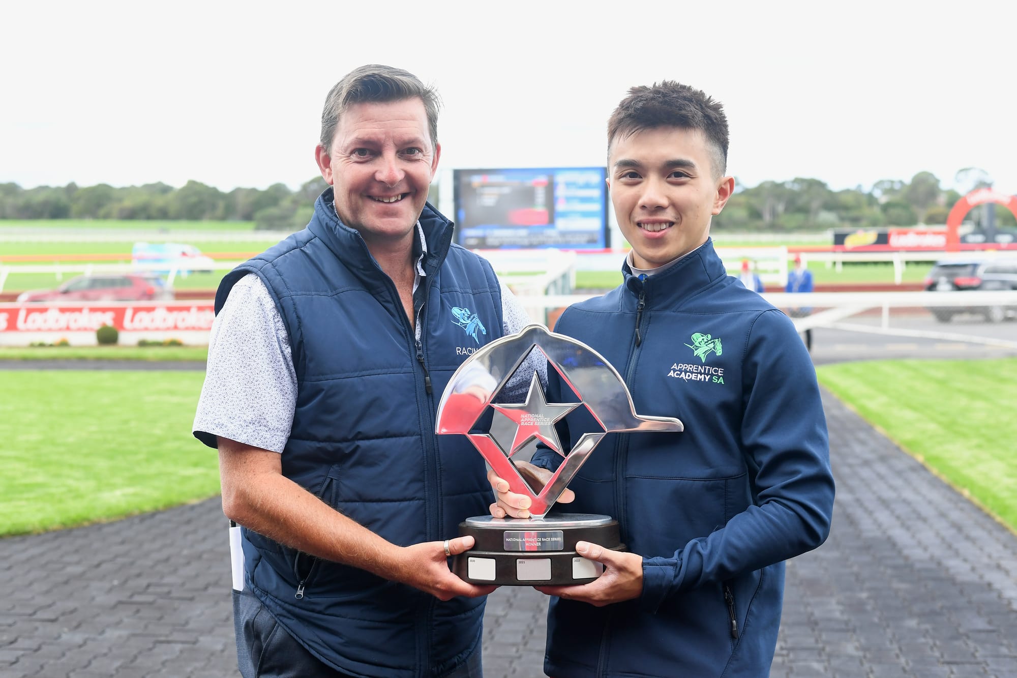 SA jockey coach Dean Pettit and jockey Angus Chung.